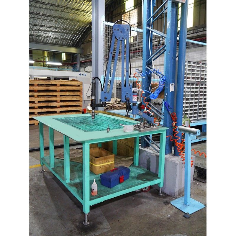 Cantilever pneumatic tapping machine